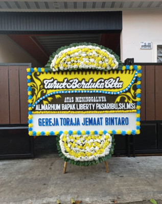 Papan Bunga Duka di Sonder
