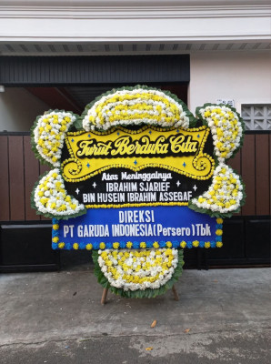 Papan Bunga Duka di Sonder